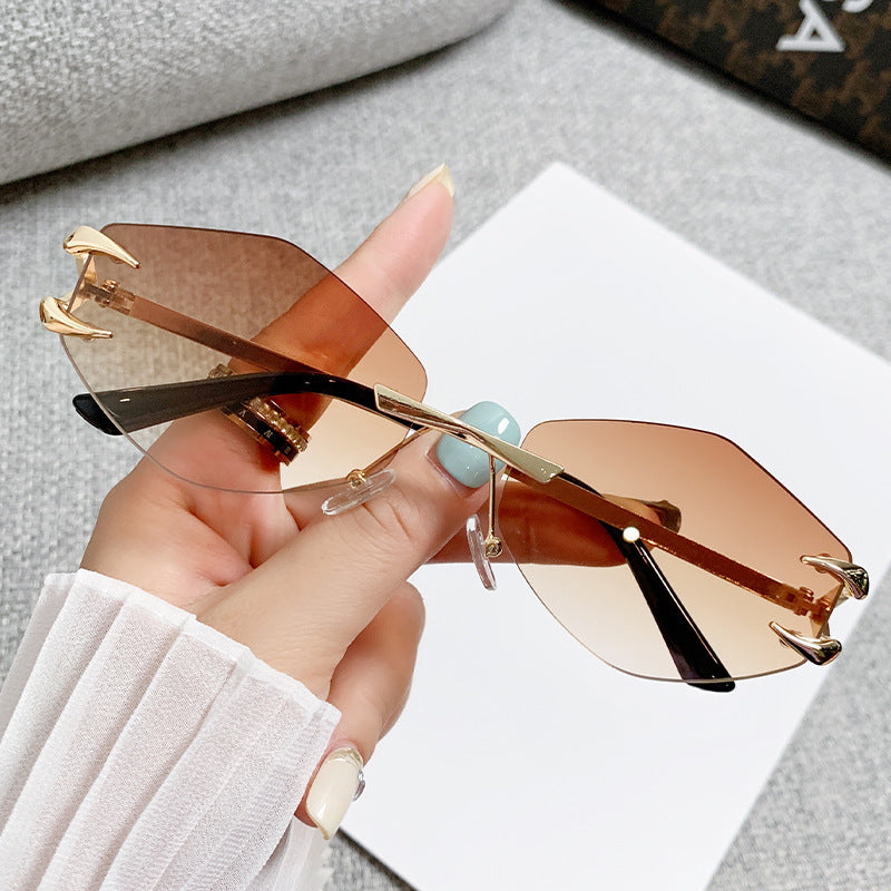 Frameless Grapple Polygonal Sunglasses Hip Hop Trend